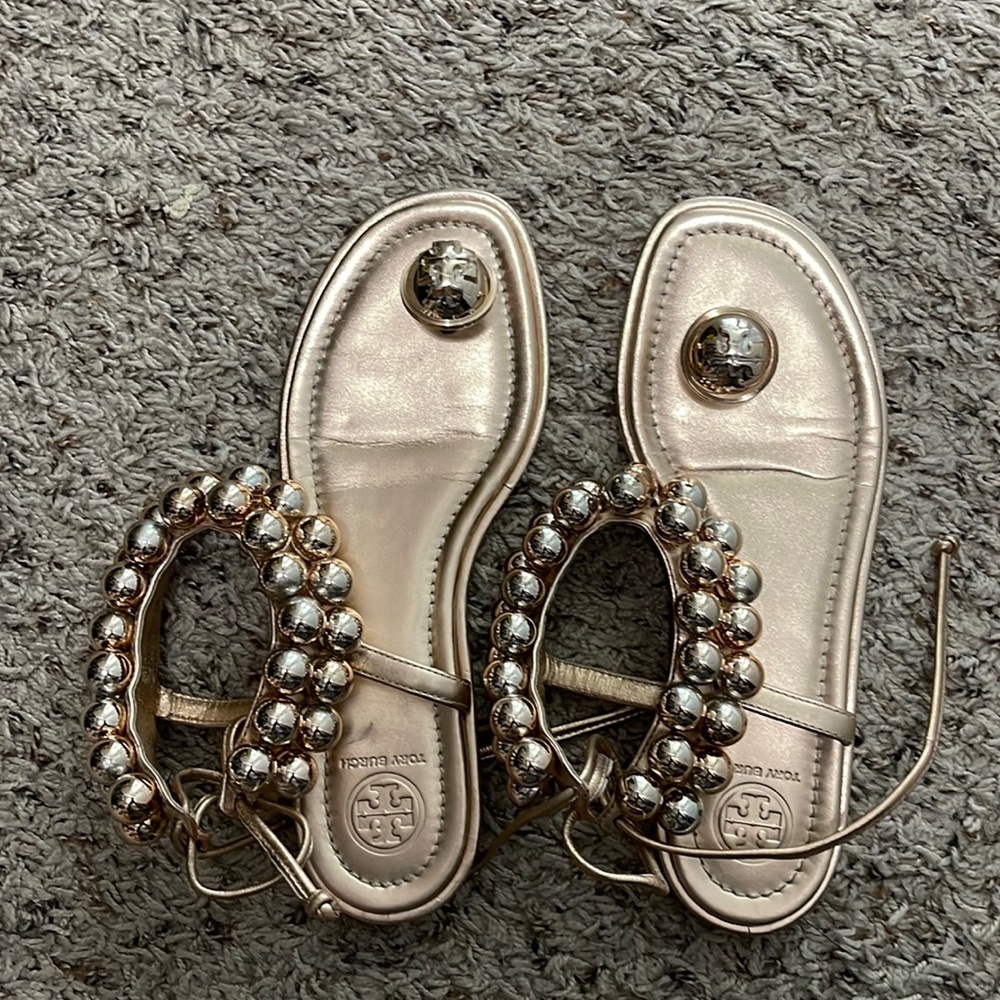 Tory Burch authentic sandals in rose gold color size 7 worn few times dust bag